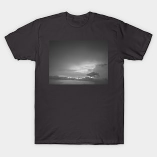 Grey white cloudscape with dark distinctive cloud shapes. T-Shirt